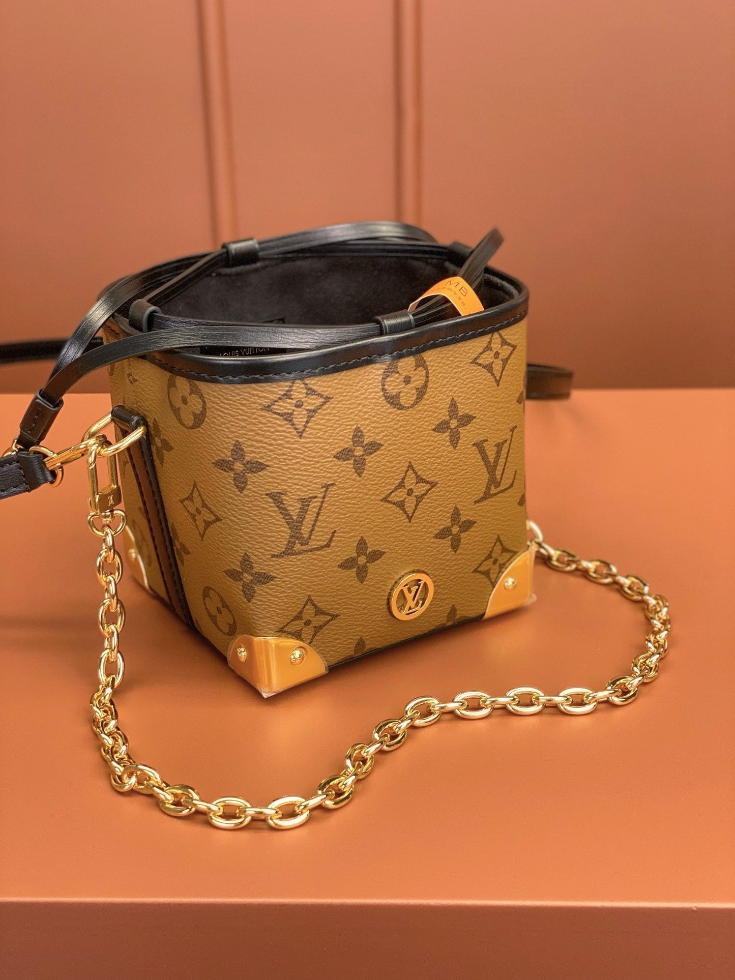 0528 Noé Purse Charms Monogram Reverse